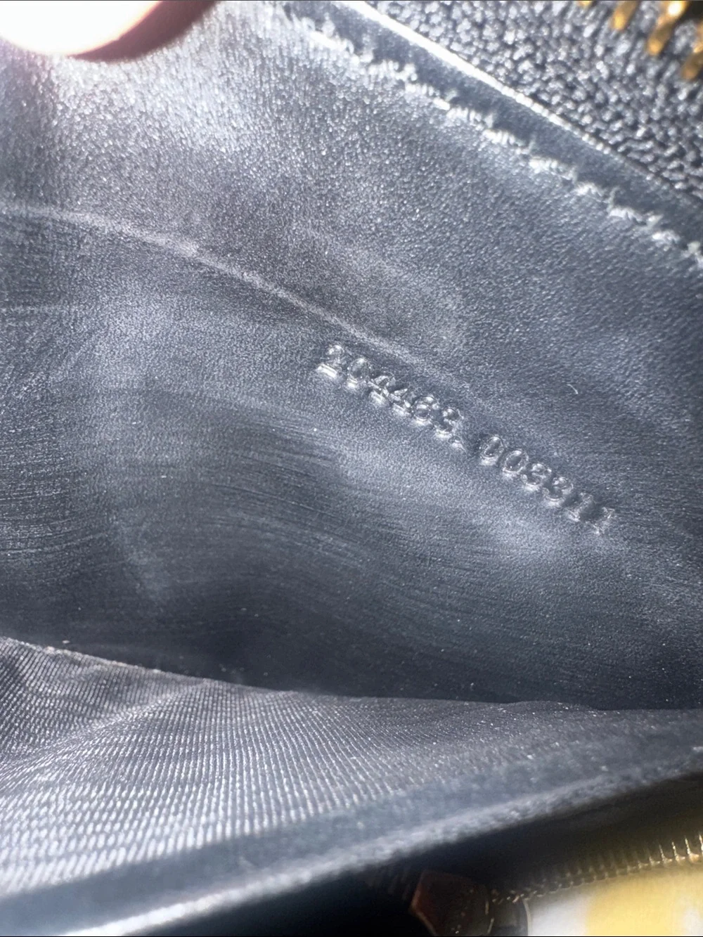 Gucci Black Embossed GG Zip Around Wallet